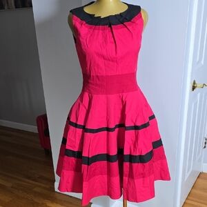 Vintage-Inspired Pink Fit & Flare Dress with Black Trim